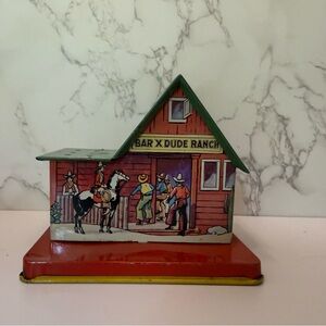 Vintage Bar X Dude Ranch tin lithograph coin bank designed to hold lollipops